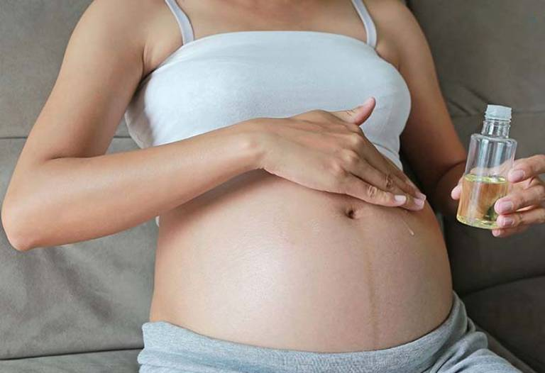 Dầu dừa hỗ trợ trị bụng rạn sau sinh